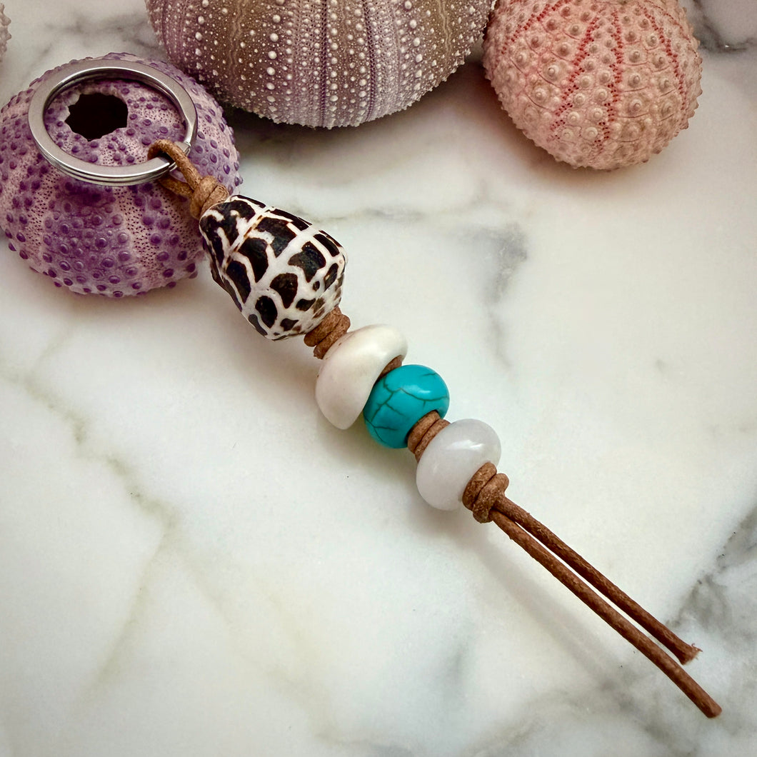 A. HEBREW SHELL KEYCHAIN (K1)