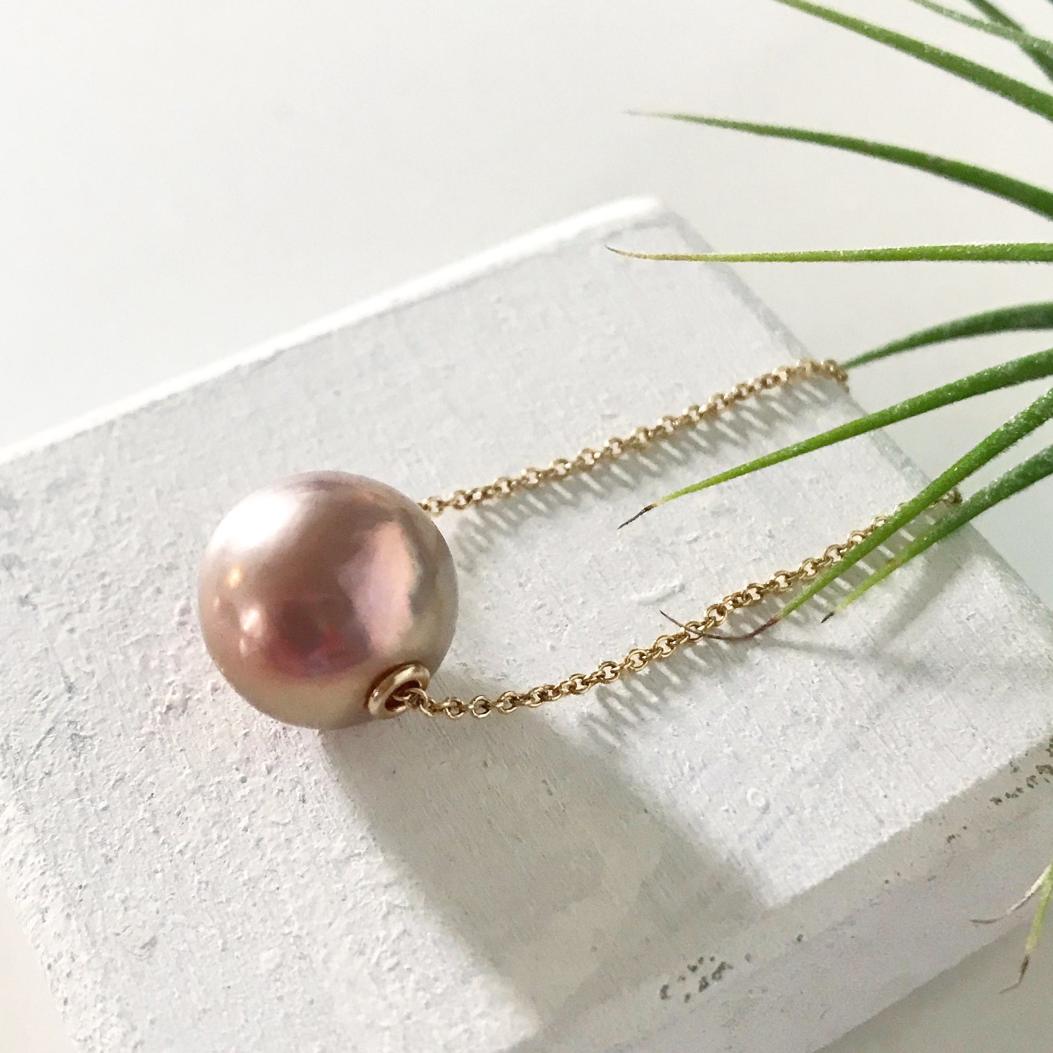Floating pearl pendant deals