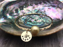 GOLDEN SOUTH SEA PEARL BANGLE W/ ALOHA COIN CHARM